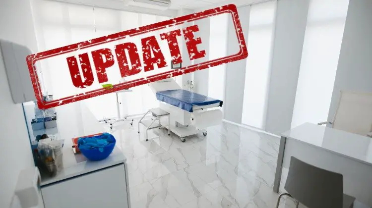 doctor's office exam room with Update text