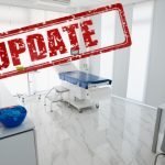 doctor's office exam room with Update text